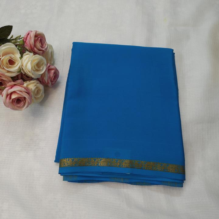 Sky Blue & Peacock Zari Border Saree