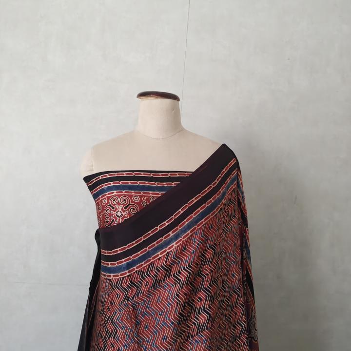 Pure Modal Silk Ajrakh Saree in Indigo, Rust Red & Black with Chevron Waves & Geometric Star Border