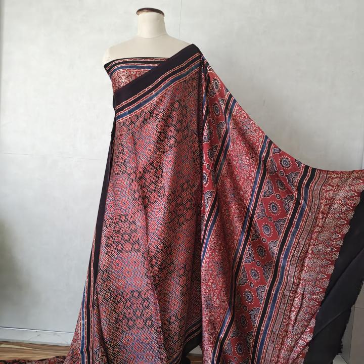 Pure Modal Silk Ajrakh Saree in Indigo, Rust Red & Black with Chevron Waves & Geometric Star Border