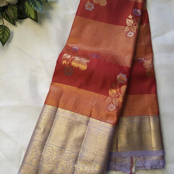 Semi Silk Saree in Rust Copper-Orange with Floral Motifs & Contrast Pastel Lavender Zari Border
