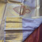 Semi Silk Saree in Rust Copper-Orange with Floral Motifs & Contrast Pastel Lavender Zari Border