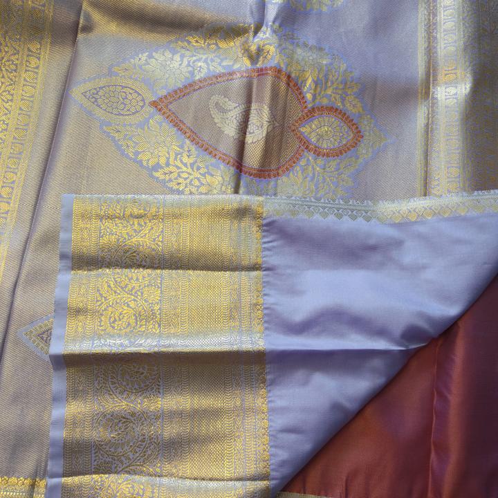 Semi Silk Saree in Rust Copper-Orange with Floral Motifs & Contrast Pastel Lavender Zari Border