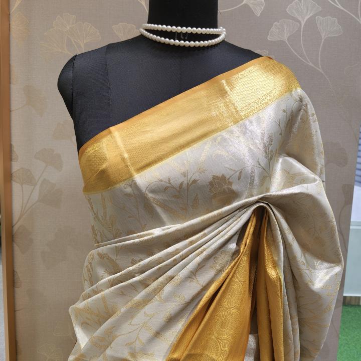 Semi Silk Saree in Silver-White Brocade with All-Over Floral Jaal & Contrast Mustard Gold Border