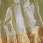 Semi Silk Saree in Silver-White Brocade with All-Over Floral Jaal & Contrast Mustard Gold Border