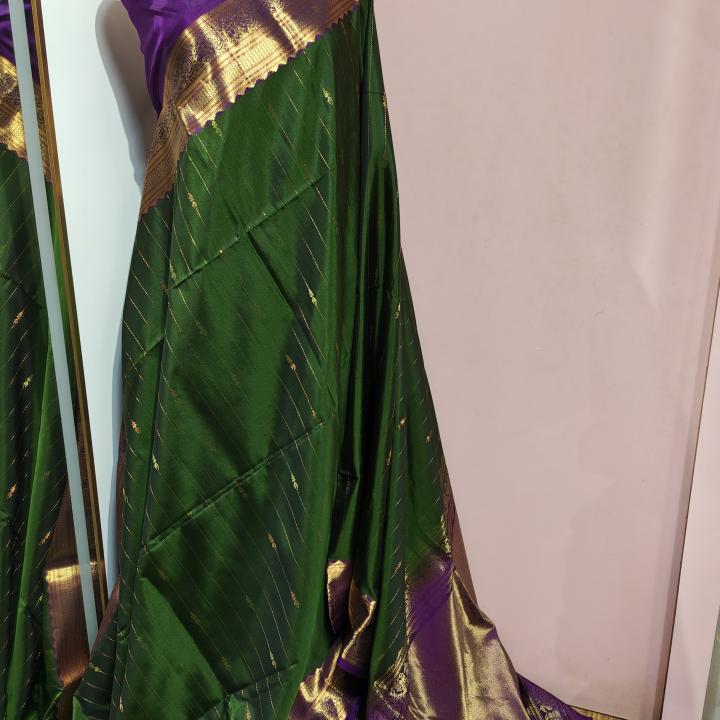 Soft Silk Saree in Bottle Green & Imperial Purple with Gold Zari Lines, Motifs & Brocade Border