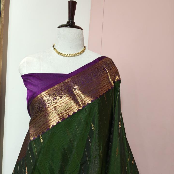 Soft Silk Saree in Bottle Green & Imperial Purple with Gold Zari Lines, Motifs & Brocade Border