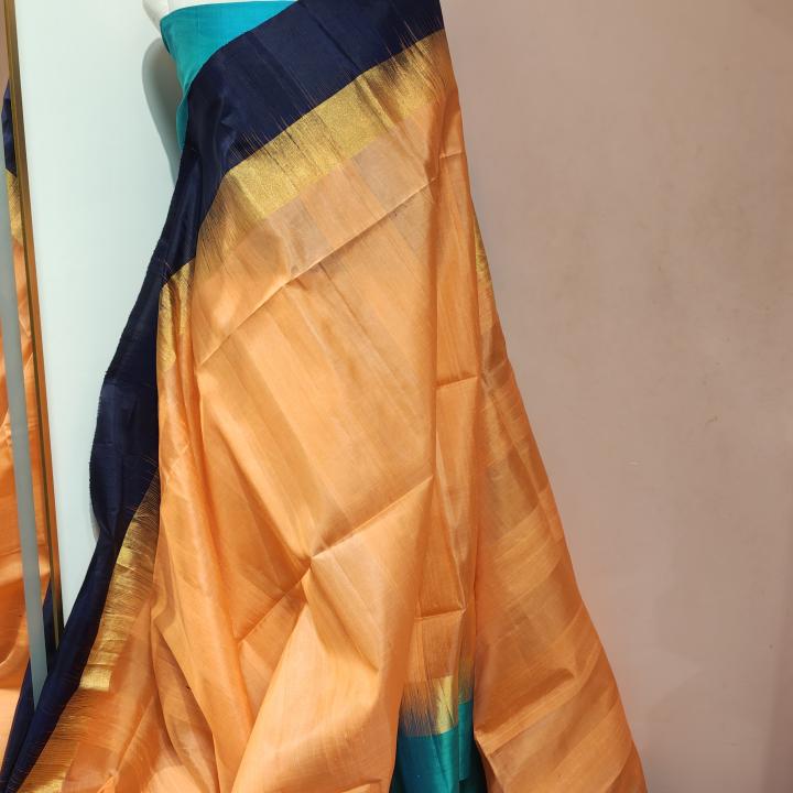 Soft Silk Saree in Soft Mango Peach & Midnight Navy Blue with Temple Zari Border & Peacock Blue Accents